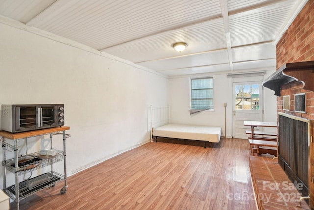 living area featuring hardwood / wood-style floors