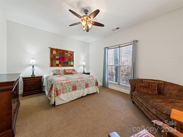 carpeted bedroom with ceiling fan