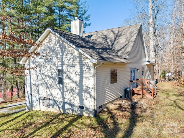 view of home's exterior featuring a lawn