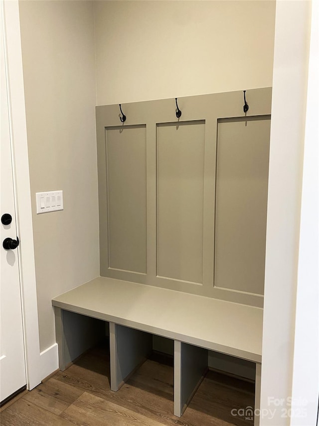 mudroom with wood finished floors