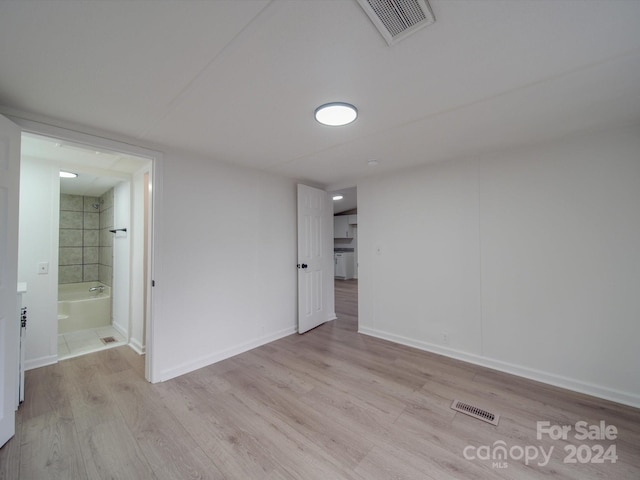 empty room featuring light hardwood / wood-style floors