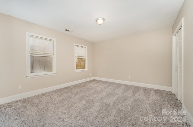 spare room with carpet flooring