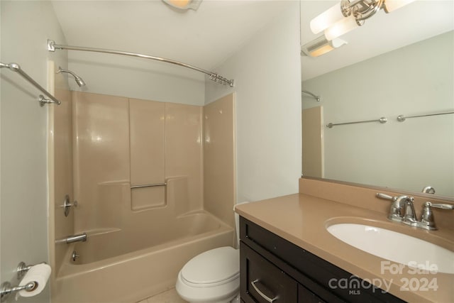 full bathroom featuring vanity, toilet, and bathtub / shower combination