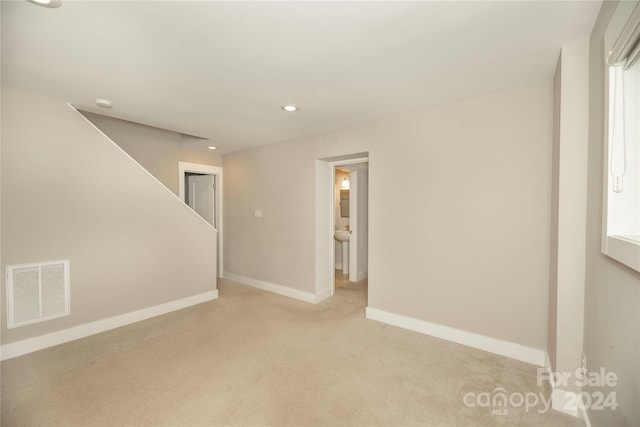 view of carpeted spare room