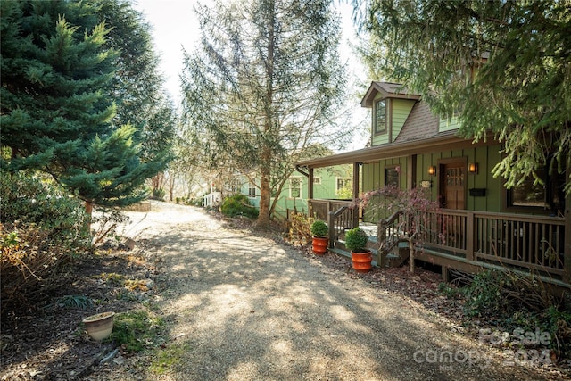 view of yard with a porch