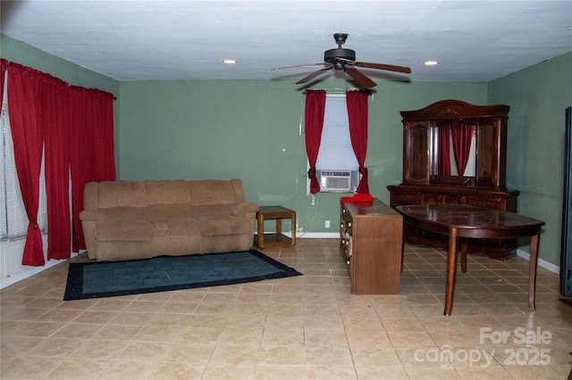 living area featuring cooling unit and ceiling fan