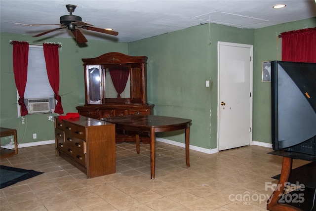 dining area with cooling unit and ceiling fan