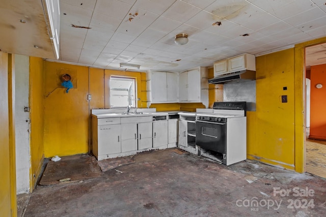 kitchen with electric range, white cabinets, concrete flooring, and sink