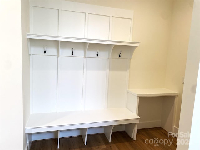 mudroom with wood finished floors