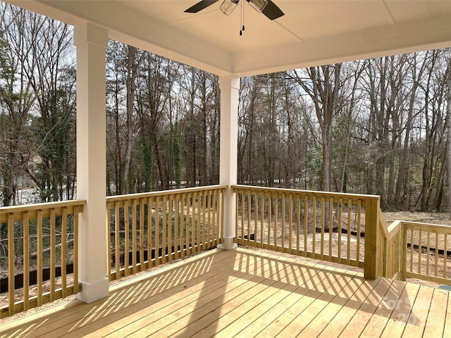 wooden deck with ceiling fan