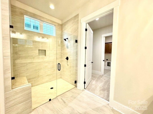 bathroom featuring walk in shower