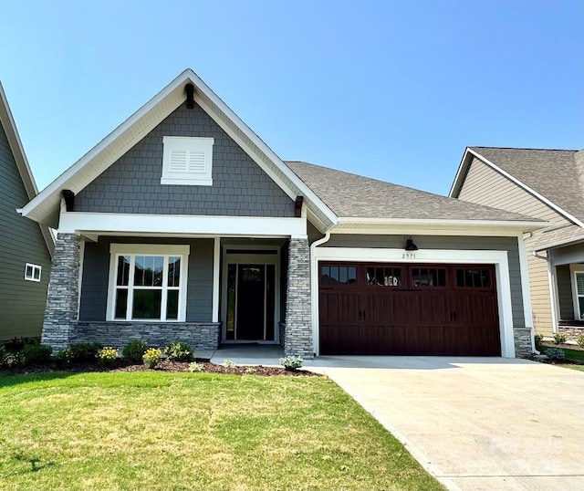 2971 Alveston Dr NW Unit 29, Concord, NC 28027 - craftsman inspired home featuring an attached garage, stone siding, concrete driveway, and a front yard