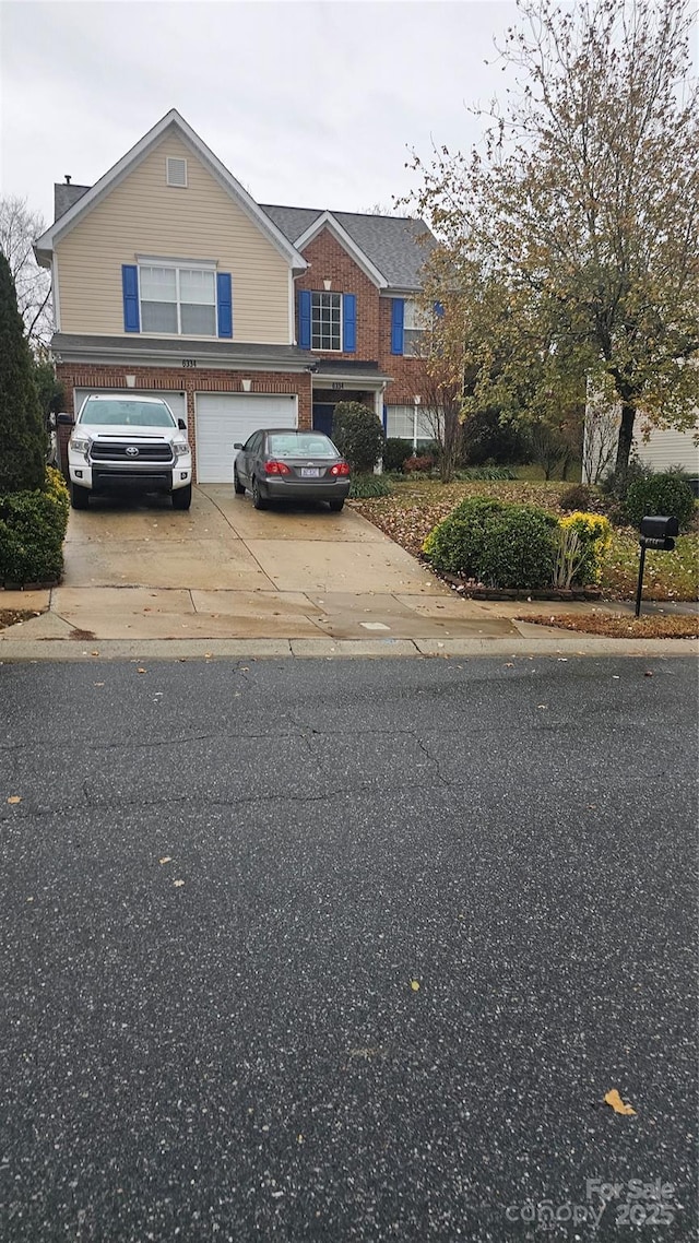 view of front of home with a garage