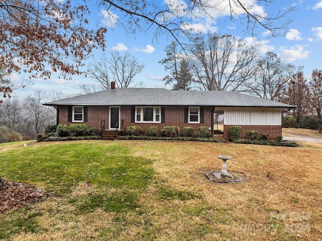 ranch-style house with a front yard