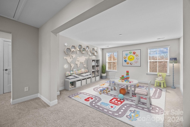 playroom featuring light carpet and a wealth of natural light