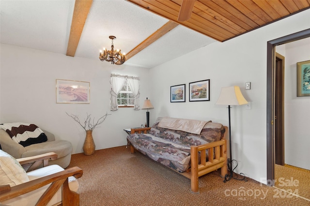 living room featuring carpet flooring, a chandelier, and beamed ceiling