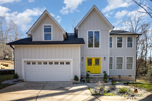 view of front facade with french doors and a garage