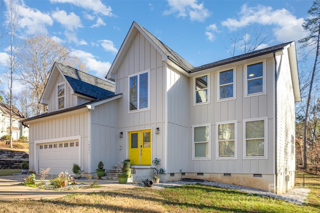 view of front of property with a garage