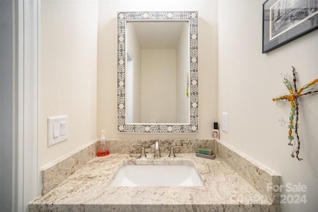 bathroom featuring vanity