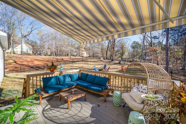 wooden terrace featuring an outdoor living space