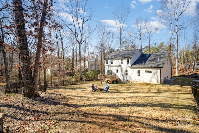 view of yard with a wooden deck