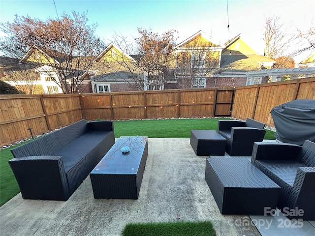 view of patio featuring a fenced backyard and an outdoor hangout area