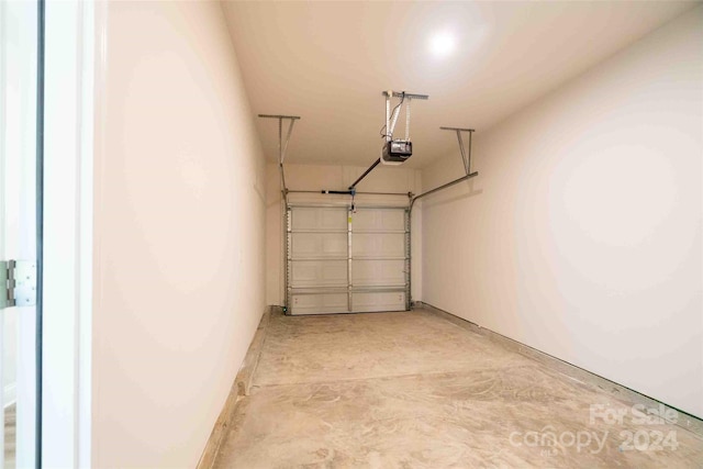 garage featuring a garage door opener