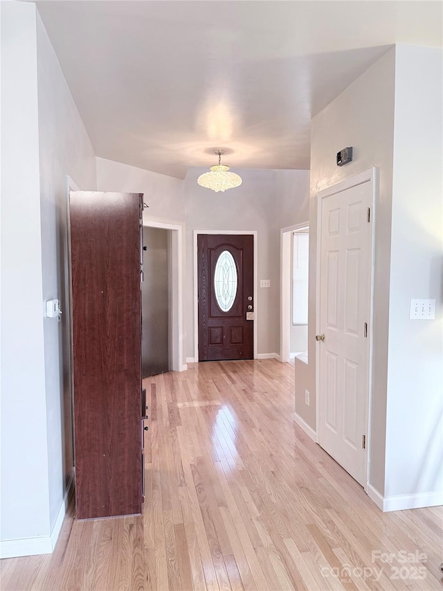 entrance foyer featuring light wood-type flooring