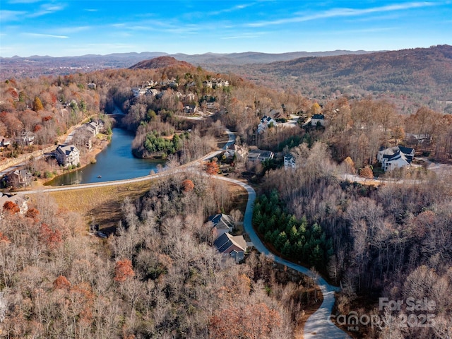 bird's eye view with a water and mountain view