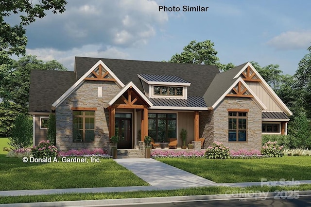 view of front of home with a front lawn and french doors