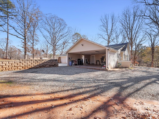 view of property exterior with covered porch