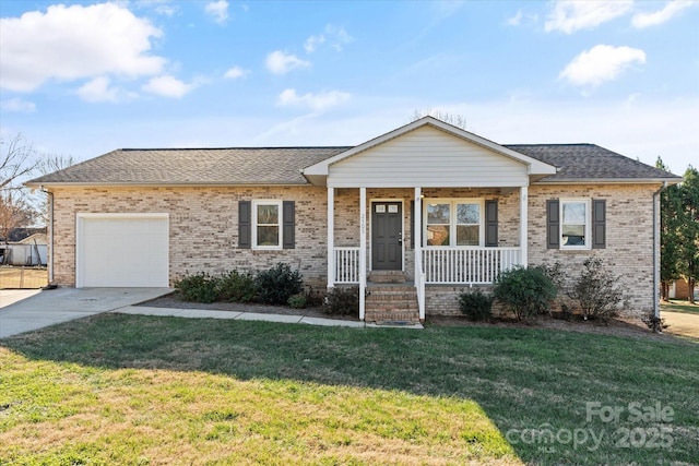 view of front of property with a porch, an attached garage, brick siding, concrete driveway, and a front yard