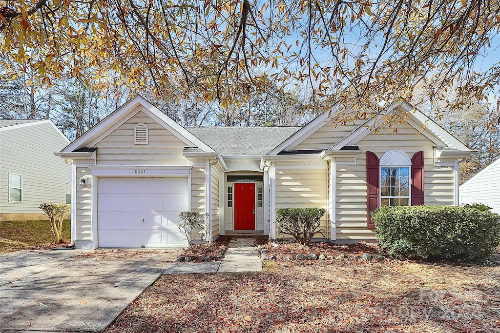 view of front of home with a garage