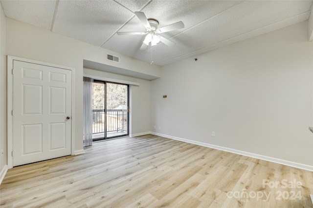 unfurnished room with ceiling fan and light hardwood / wood-style floors