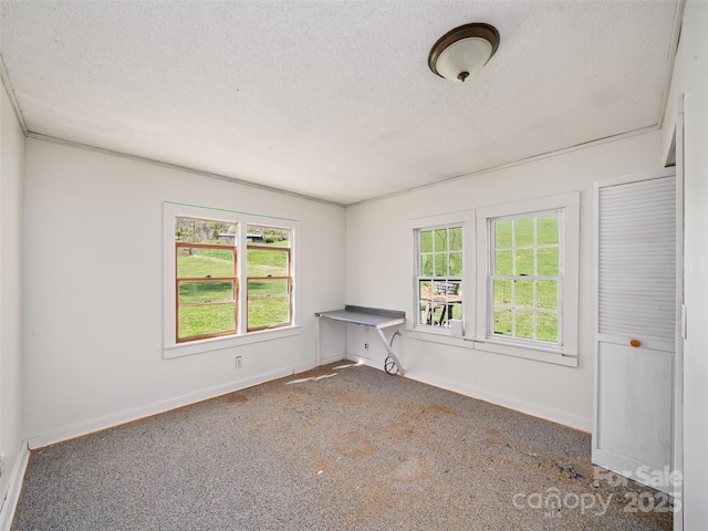 1 Gordon Silvers Rd, Bakersville, NC 28705 - unfurnished room with carpet, baseboards, and a textured ceiling