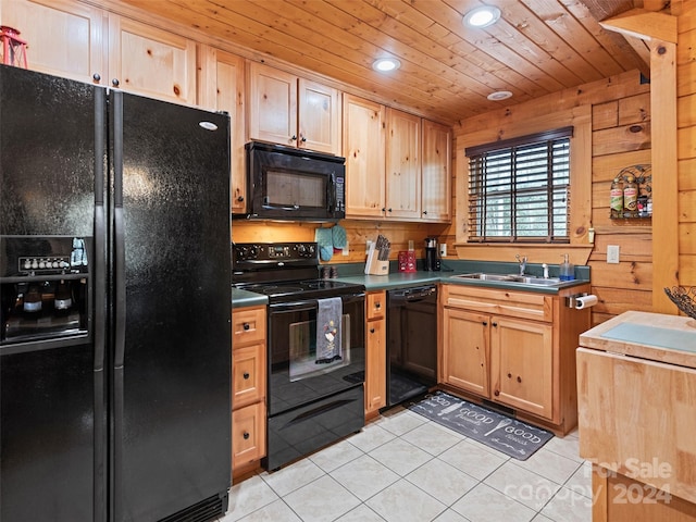 kitchen featuring wood ceiling, sink, light tile patterned flooring, and black appliances