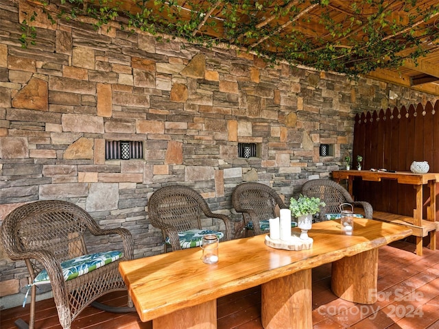 dining space with hardwood / wood-style floors