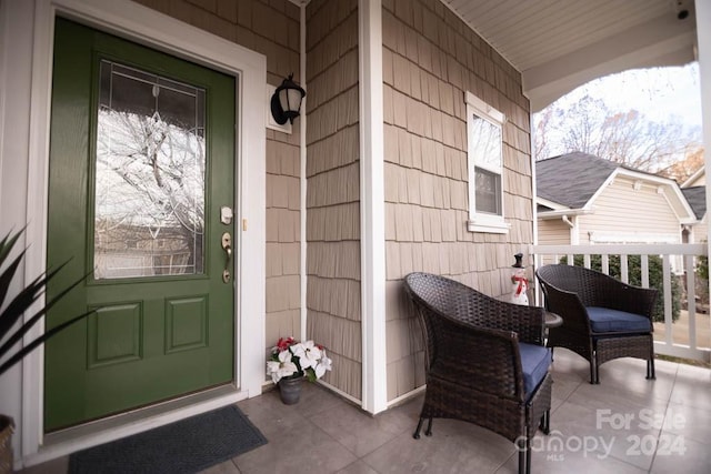 property entrance with a porch