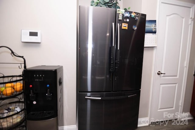 interior details with stainless steel refrigerator