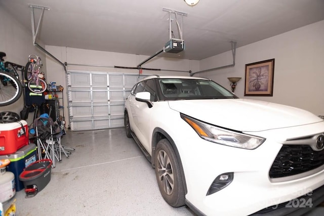 garage featuring a garage door opener