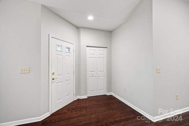 foyer entrance with dark wood-type flooring