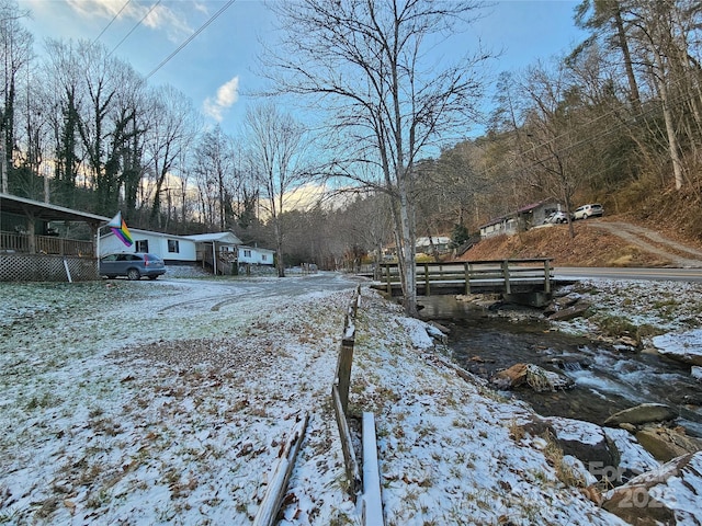 view of yard covered in snow