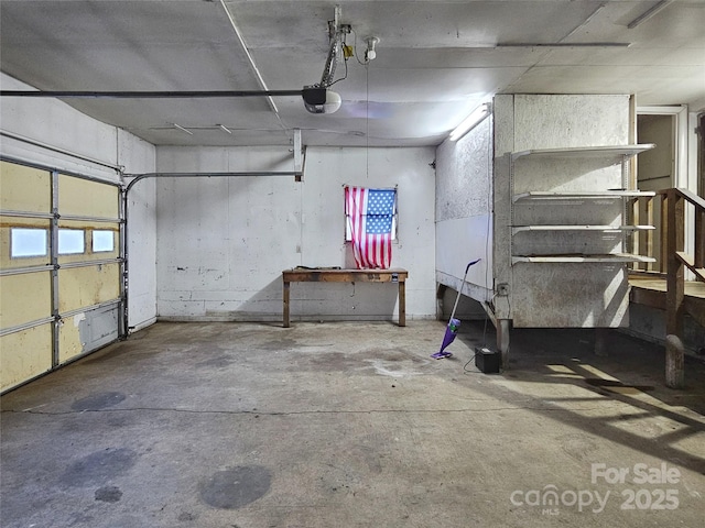 garage featuring a garage door opener