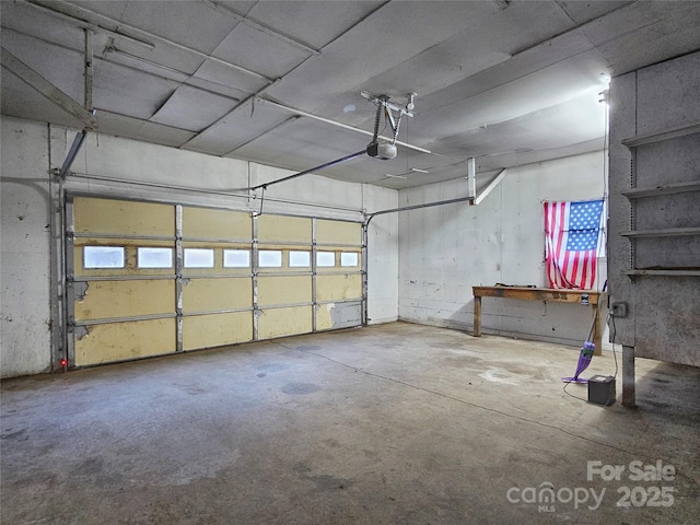 garage featuring a garage door opener