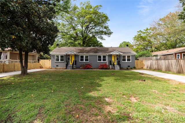 ranch-style house featuring fence, crawl space, and concrete driveway