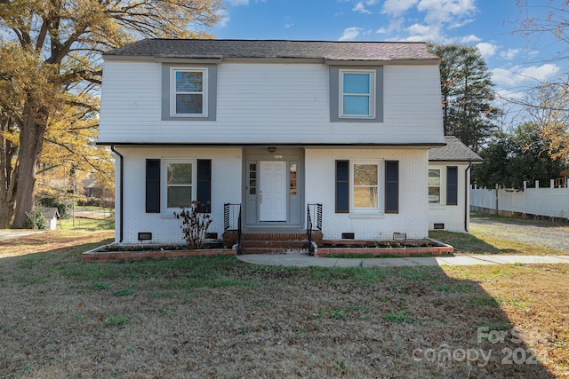 view of front of property with a front yard