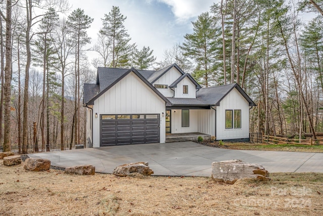 modern farmhouse with a garage