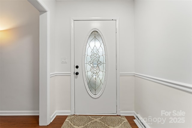 entrance foyer with dark hardwood / wood-style flooring