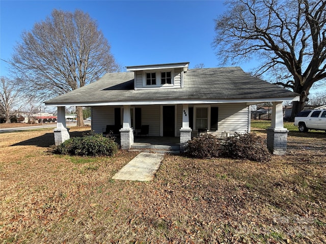 bungalow-style home featuring covered porch