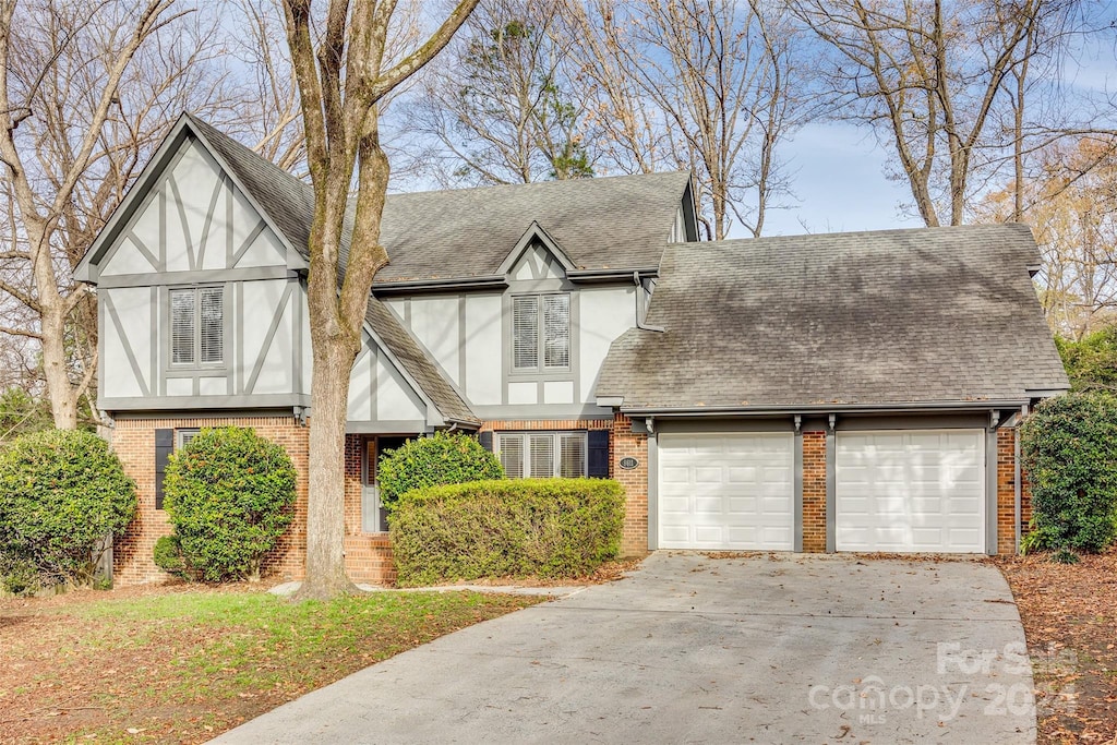 tudor house with a garage